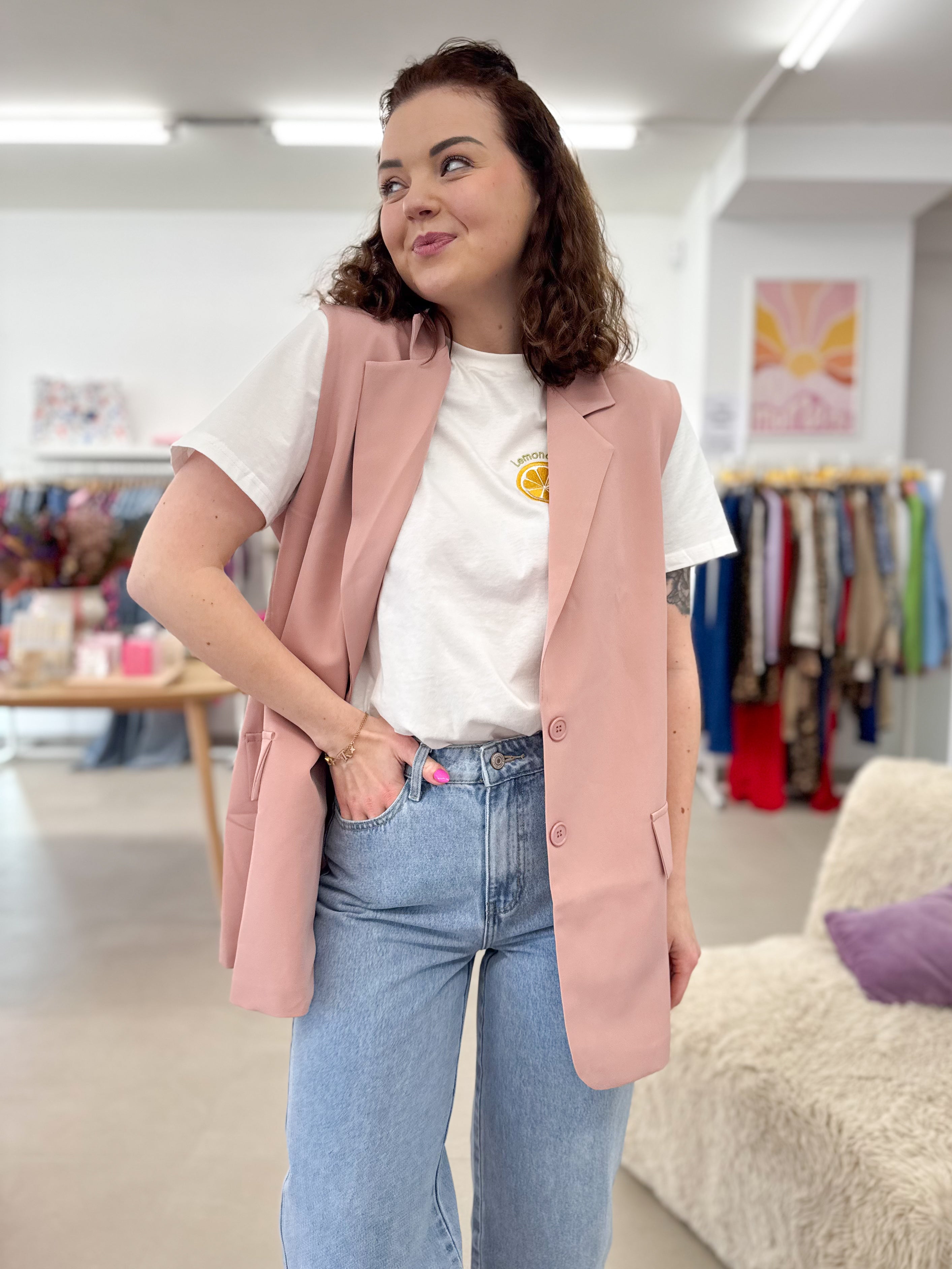 Open back sleeveless blazer
